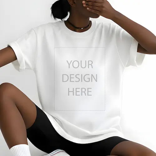 Relaxed Fit White T-Shirt Mockup on Seated Black Female Model – Minimal Lifestyle Studio Shot